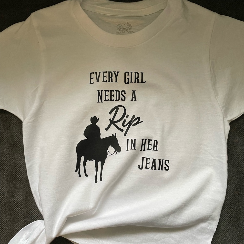 Rip in her jeans. Yellowstone.